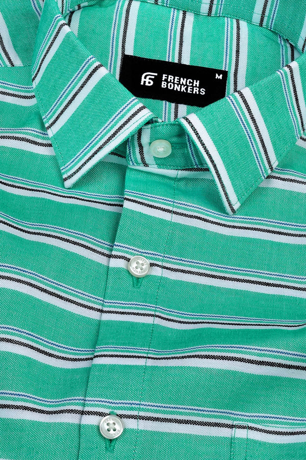 Parakeet green with blue black and white aradonis stripe shirt