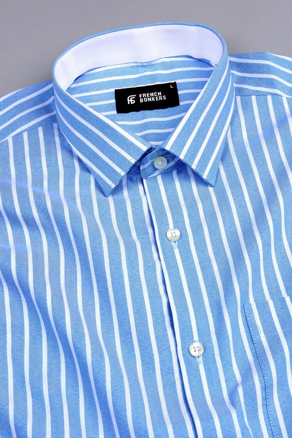 White with sky blue awning stripe shirt