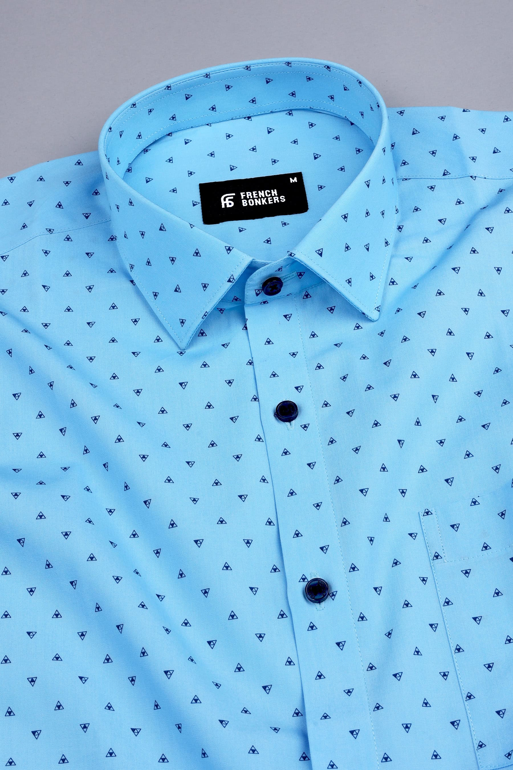 Sky blue with dark blue up down triangle printed shirt