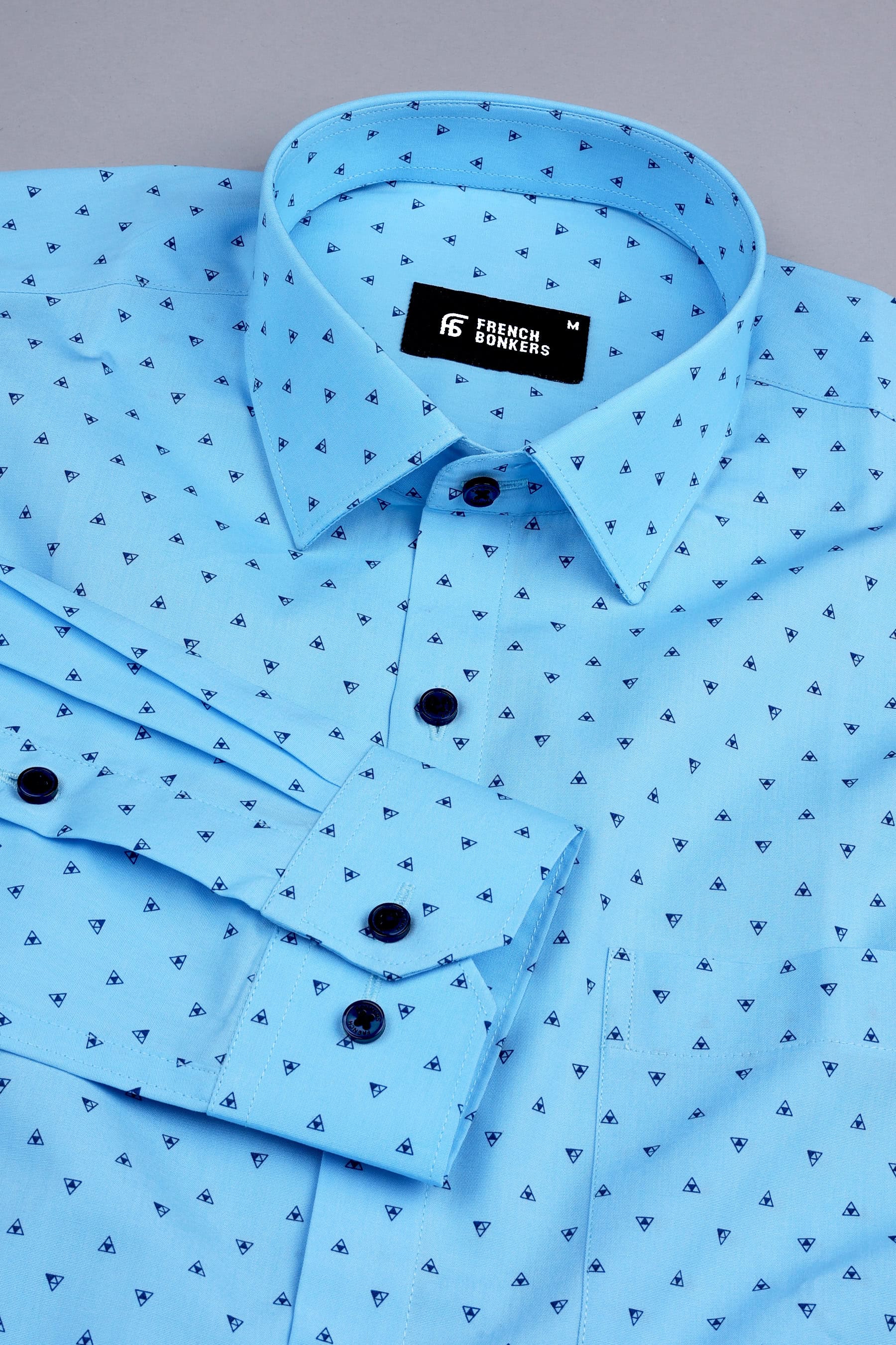 Sky blue with dark blue up down triangle printed shirt