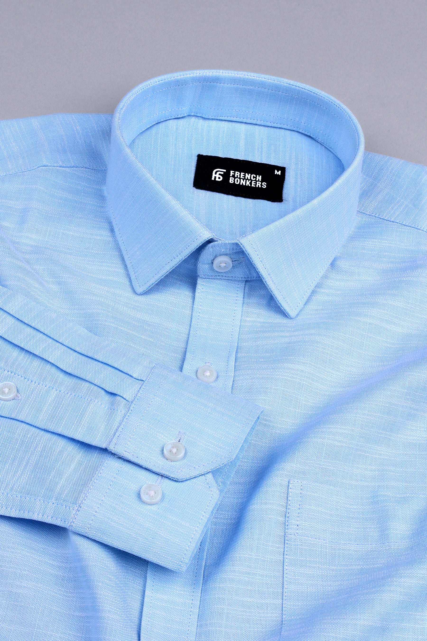 Light blue with white ruff lines solid shirt