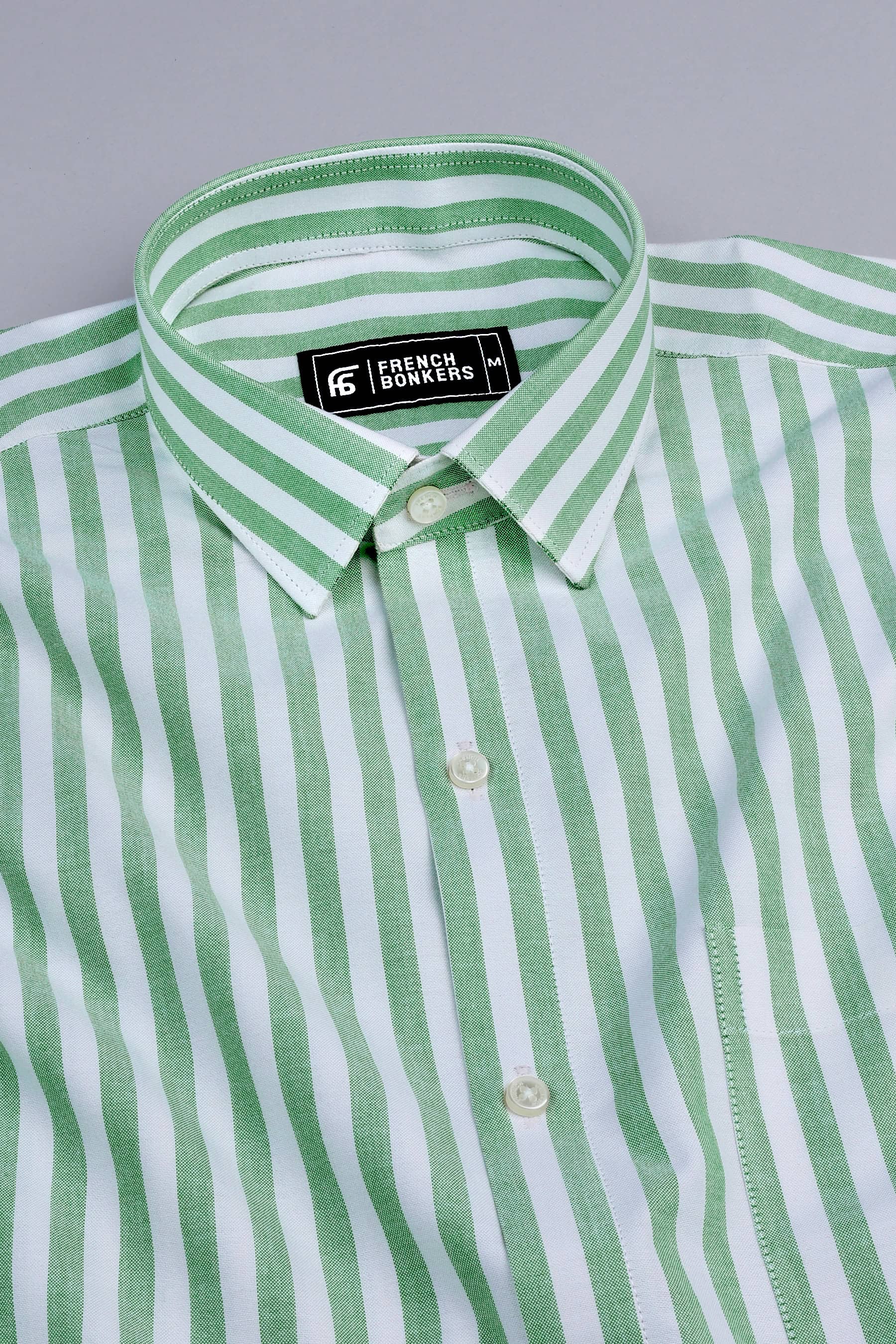 White with green stripe shirt